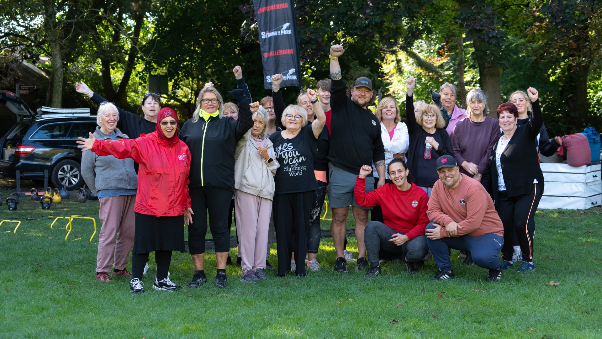 Strong in the Park members celebrating together after a session